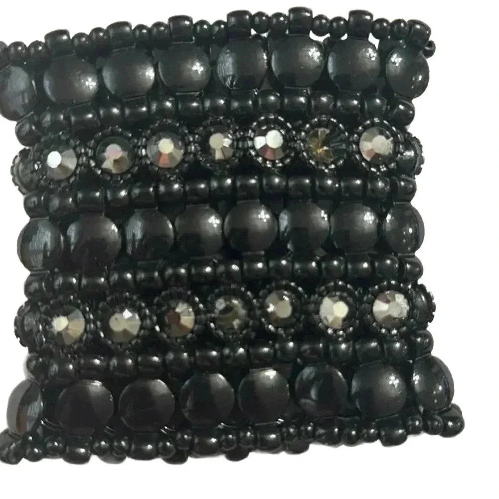 BEBE STONE AND CRYSTAL MULTI LEVEL STRETCH BRACELET